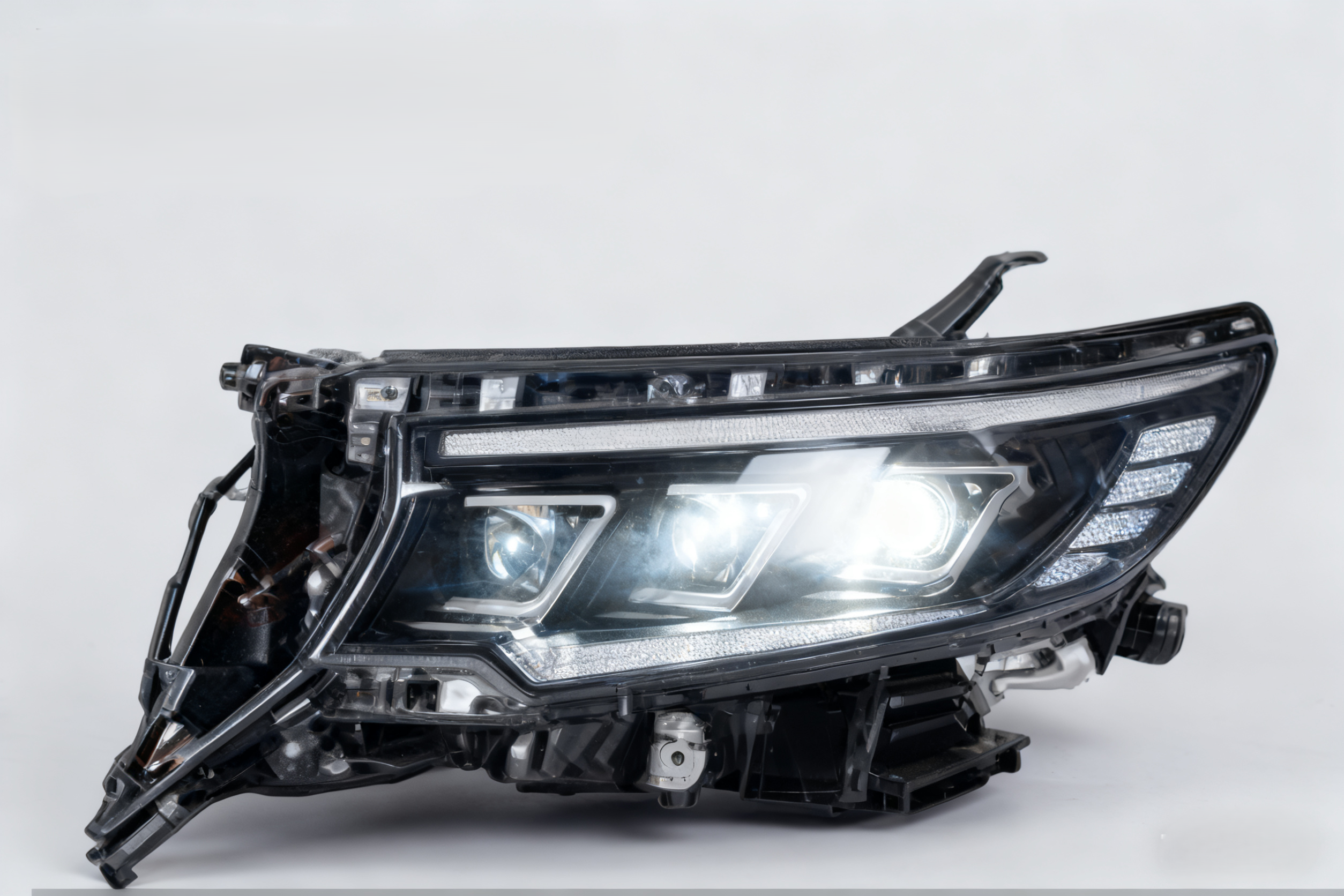 18 PRADO HEAD LAMP